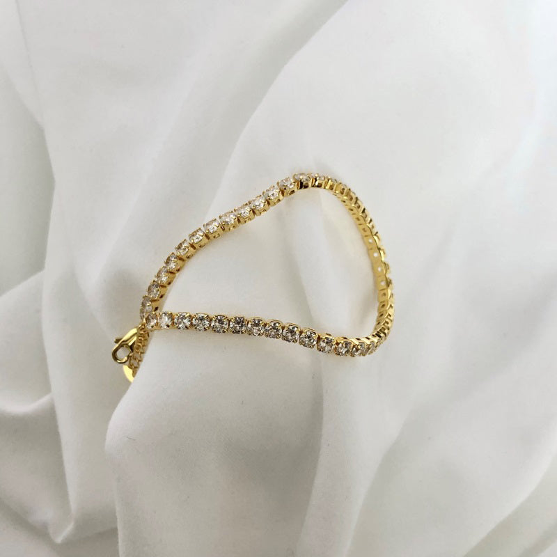 'Belle' arany bevonatú teniszkarkötő cirkóniával (3mm)